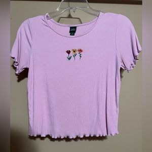 Pink crop top with embroidered flowers